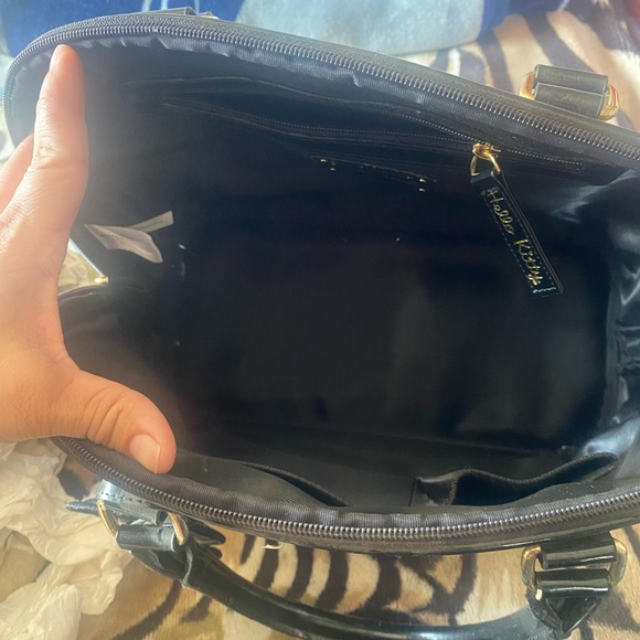 Hello kitty bowling bag cheetah print comes with dust bag has some scuffs on it. - Picture 2 of 3